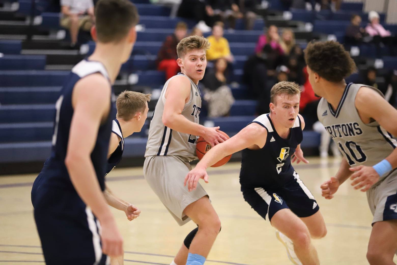 Baker's 22 leads Tritons to home win